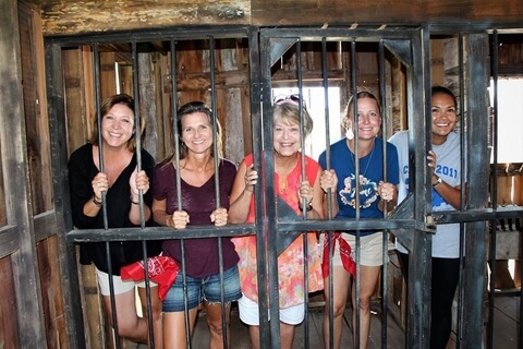 Guests snapping photos in the Old West Jail