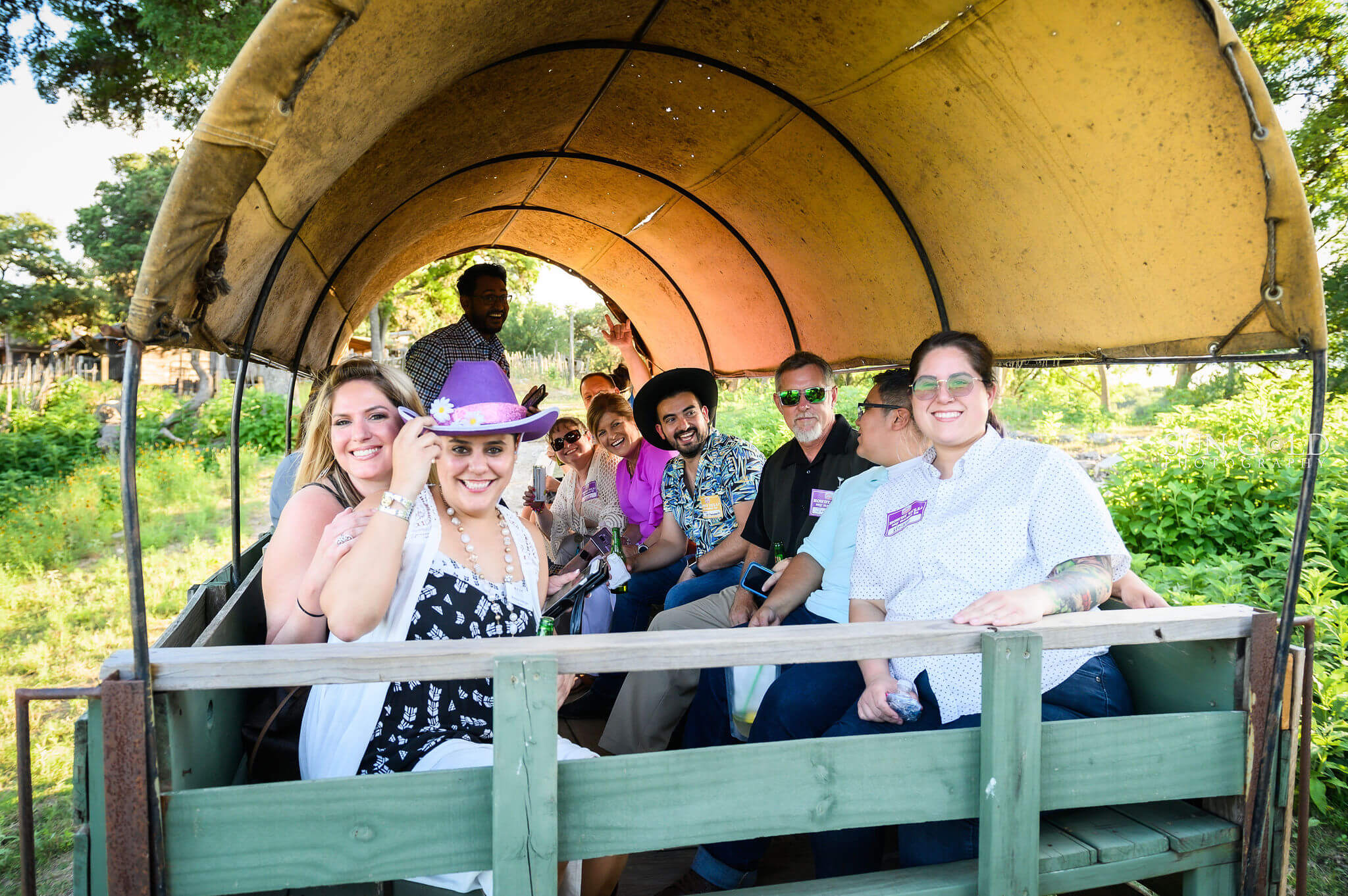 Corporate group enjoying wagon rides at Enchanted Springs Ranch! Photo courtesy of Sun Gold Photography.